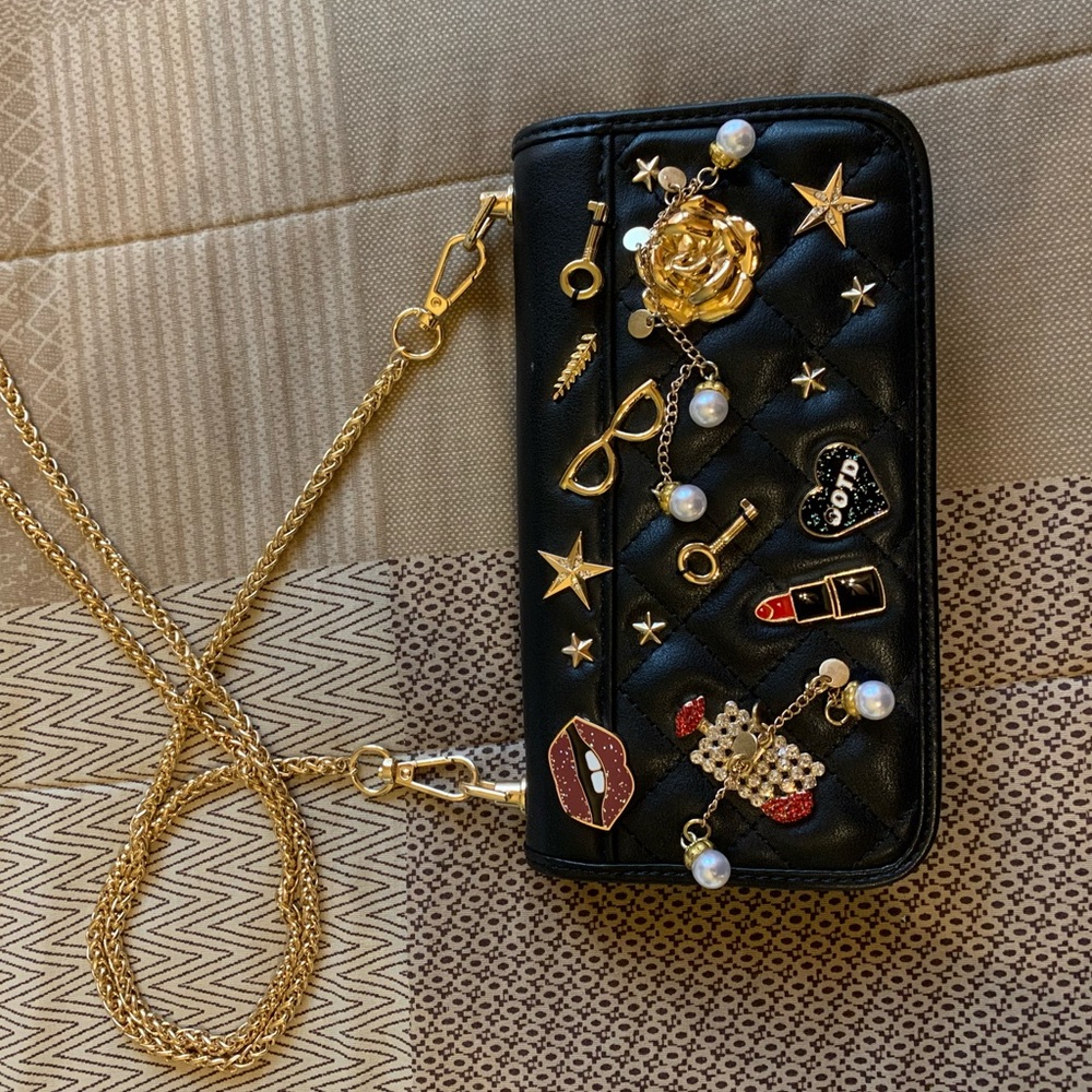 Also purse with pins lipstick makeup
